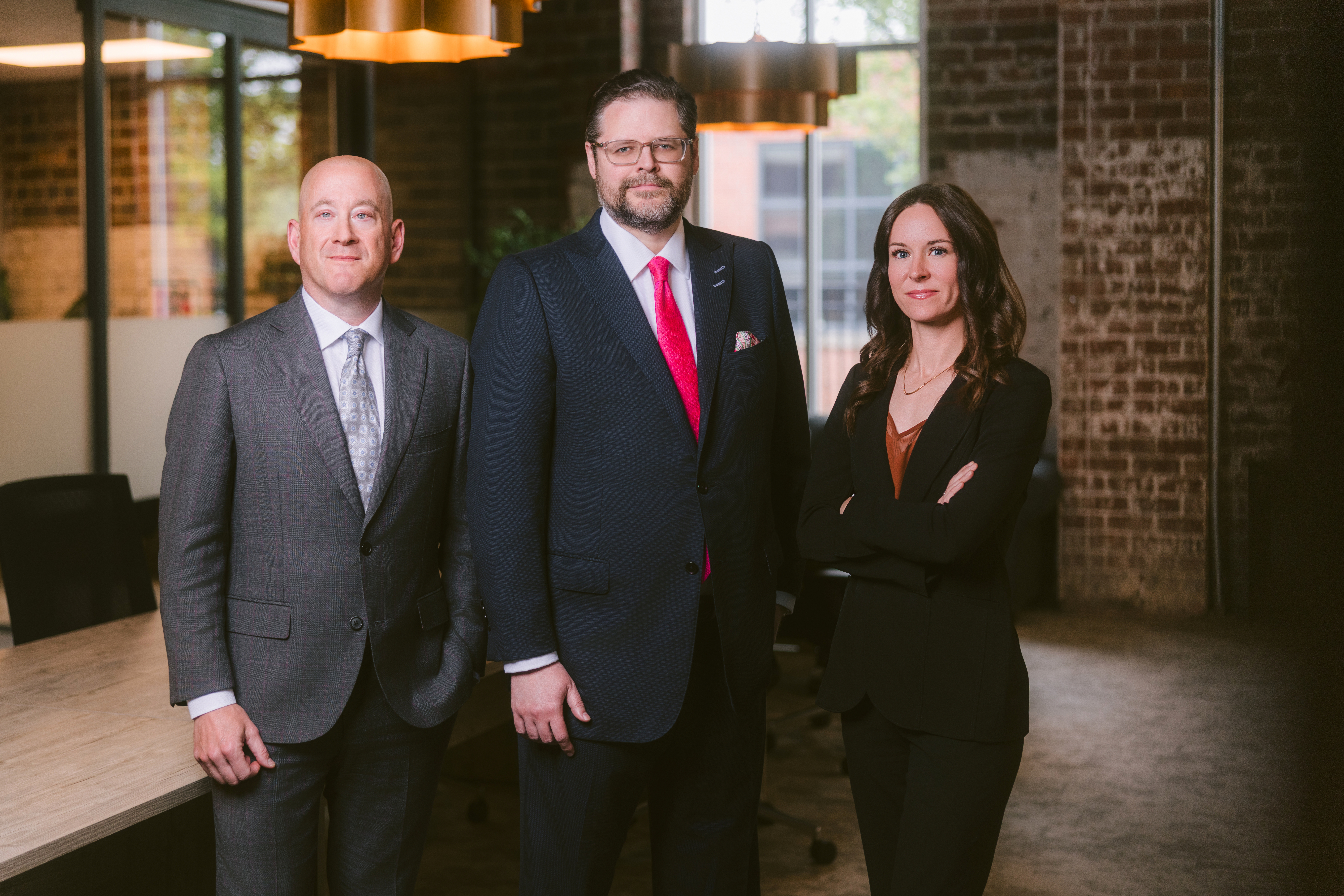 Meyer Wilson Werning attorneys Matthew Wilson, David Meyer, and Courtney Werning.